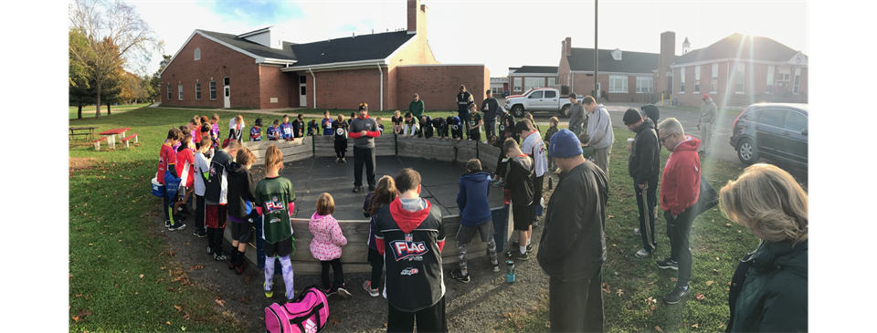 Gathering before gametime for a message on faith and character in sport