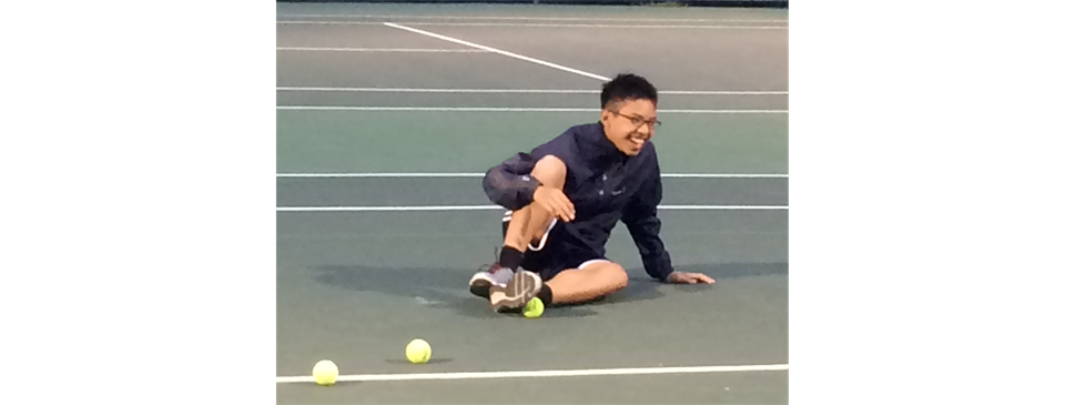 Teammate Andrew Tran enjoys his court