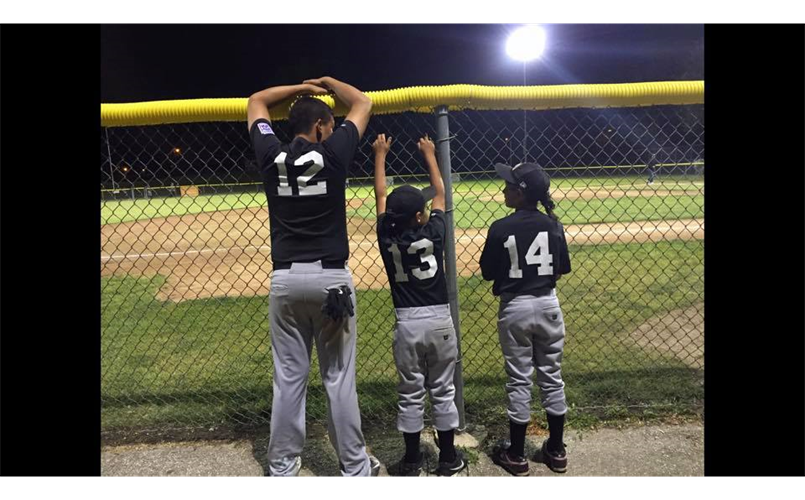 Old and young, under the lights we are all ball players