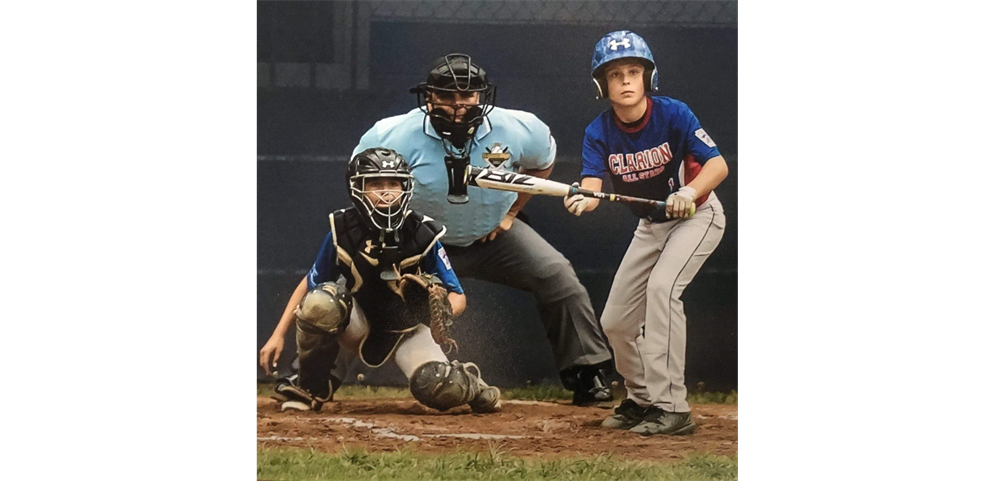 Darrin Lambert behind home plate at PA State LL Championship game