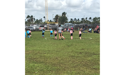 Forge FC players coaching AYSO.