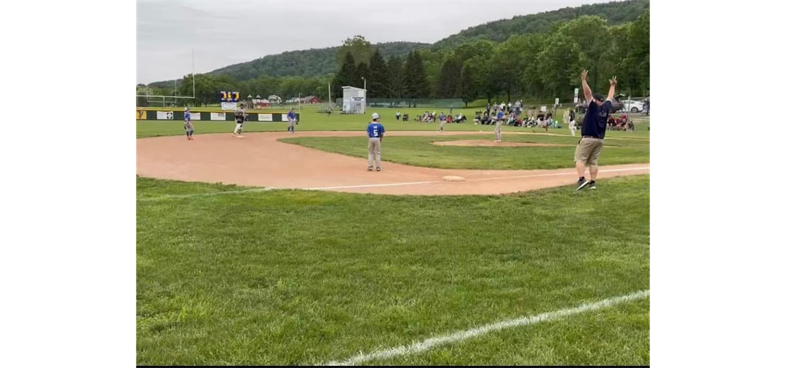 12U Celebrates a Big Homer