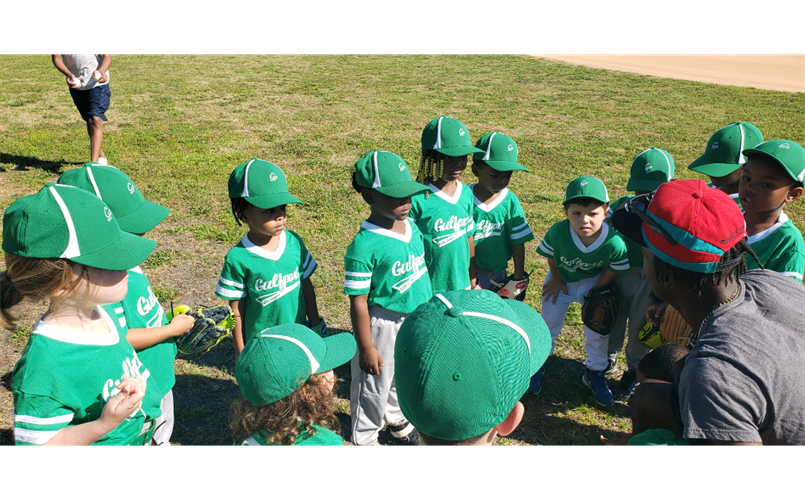 Coach J talking to our Tee-Ball players before the big game!